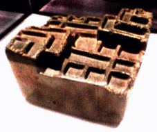 Yupana in a display case.